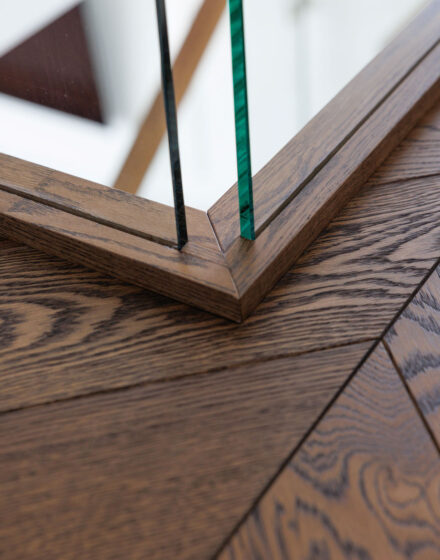 Creating Harmony: Chevron Parquet and Oak Stairs for an Elegant, Unified Style