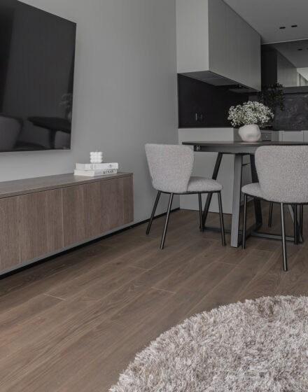 Minimalist Interior Featuring Hardwood Flooring in Cacao Shade