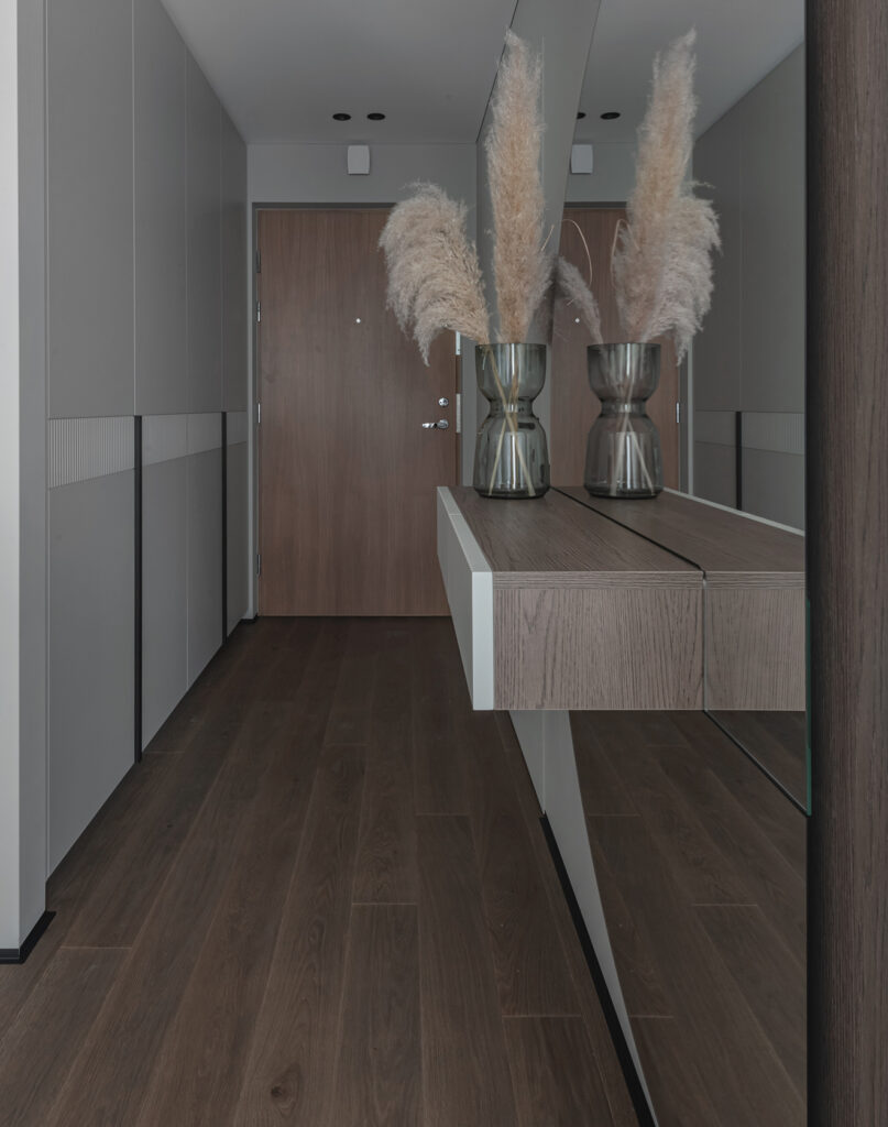 Minimalist Interior Featuring Hardwood Flooring in Cacao Shade